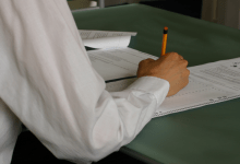 Hand writing exam classroom