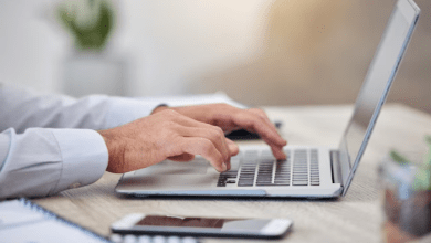 تجديد ترخيص العمل خارج أوقات الدوام في قطر 2026.. الشروط والمستندات وخطوات التقديم 7 hand laptop research with hands business man typing email keyboard office work computer internet writing with male employee work report project 590464 84928