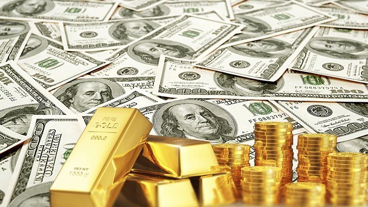 الدولار والذهب - تعبيرية